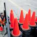 Equipment Operator for the City of Ypsilanti John Bogoski collects cones from Huron River Drive after the conclusion of the race on Sunday. Daniel Brenner I AnnArbor.com